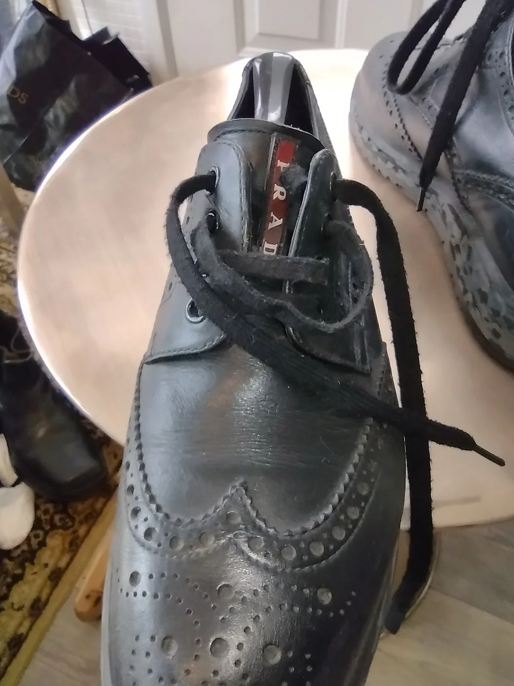 Prada Black Leather Wingtip Brogues with Camouflage Rubber Sole